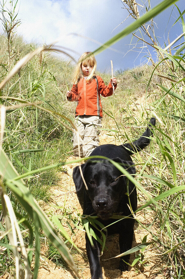 young child and labrador