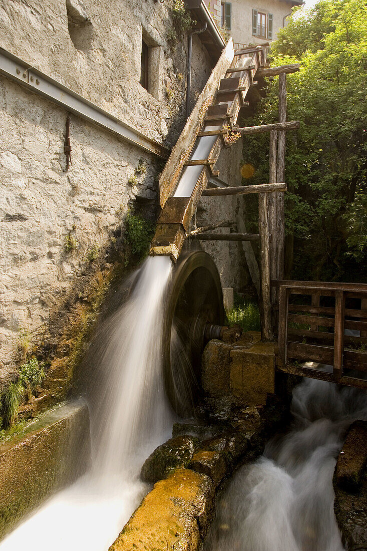 The mechanism of the ancient water mill. Bienno. Lombardia-Valcamonica. Italy.