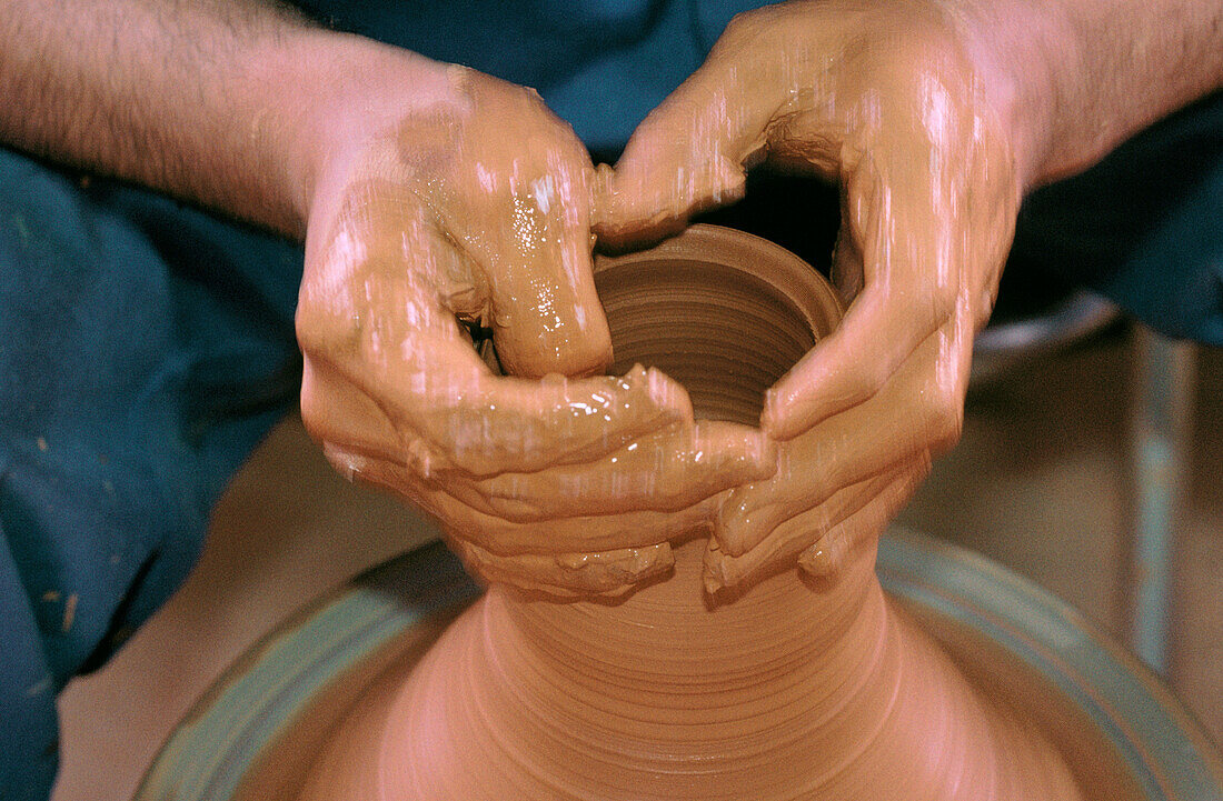 Traditional potter at work. Okinawa. Japan