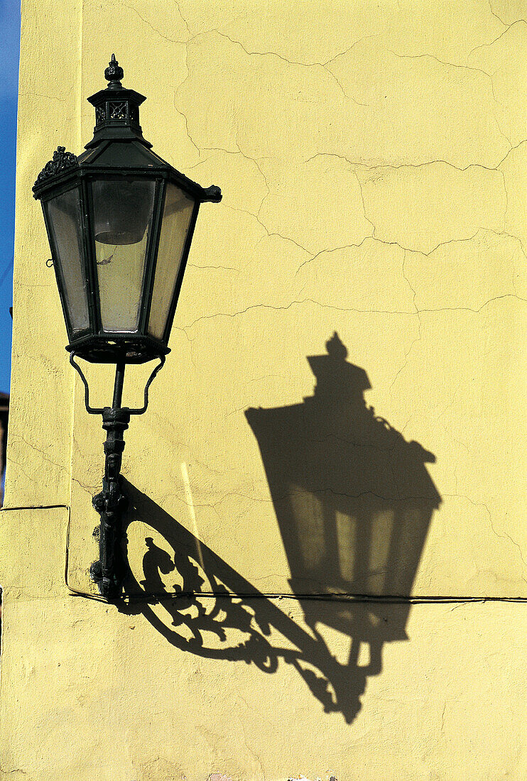 Candlelight and shadow on a wall. Prague. Czech Republic