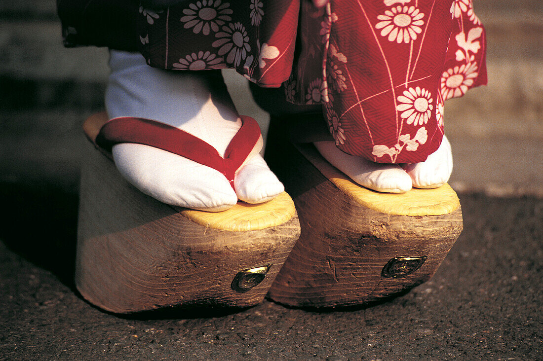 Maiko (geisha apprentice) wooden shoes okubbos . Kyoto. Japan
