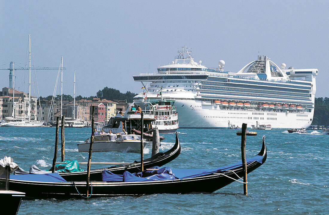 Cruise ship and gondolas. Venice. Italy