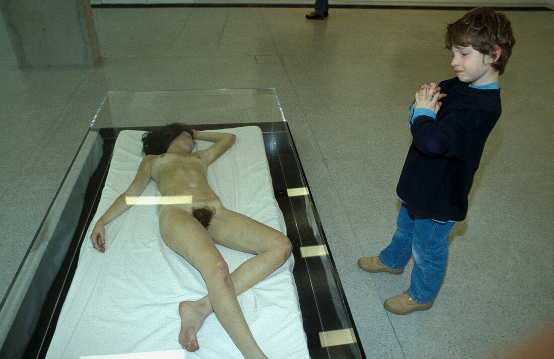 Child, visitor in front of work of art of John de Andrea, MUMOK, Museum of Modern Art Ludwig Foundation. Vienna. Austria