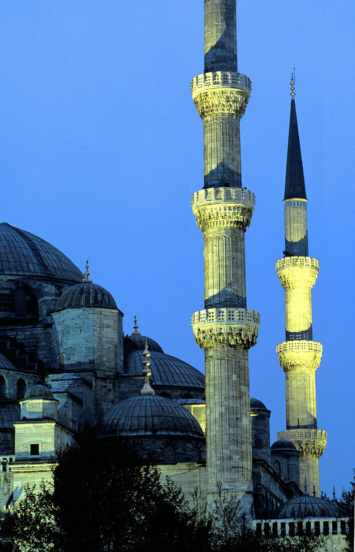 Blue mosque minarets illuminated at night. Istanbul. Turkey