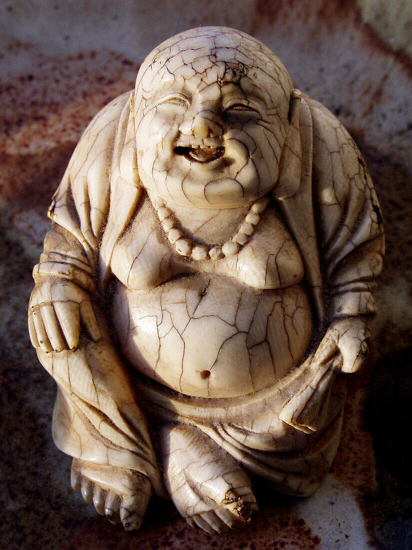 Antique Chinese laughing Buddha sculpted from ivory