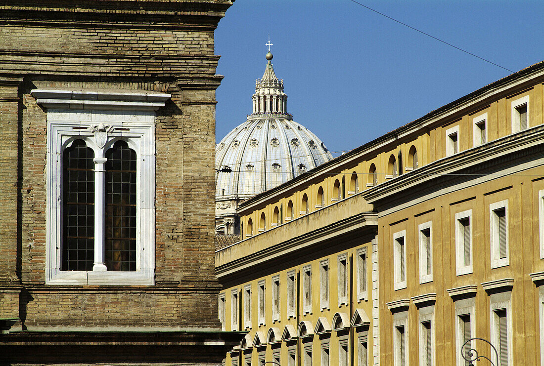 Typical buildings with Vatican, St. Peters behind. Rome. Italy