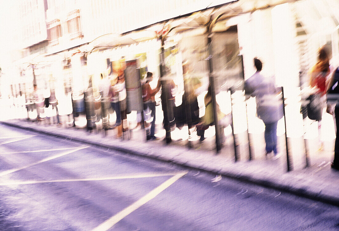  Blurred, Bus stop, Bus stops, Color, Colour, Concept, Concepts, Daytime, Exterior, Human, Many, Motion, Movement, Moving, Outdoor, Outdoors, Outside, People, Person, Persons, Public transport, Public transportation, Special effects, Stand, Standing, Stre