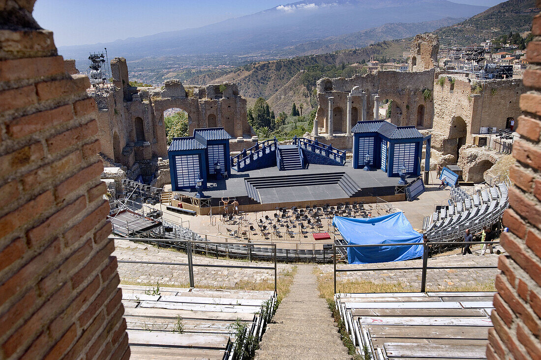 Greek theater. Preparing the scenography for Madama Butterfly opera, by Puccini. 9-12 August 2005. Etna volcano at the back. Taormina. Sicily. Italy.