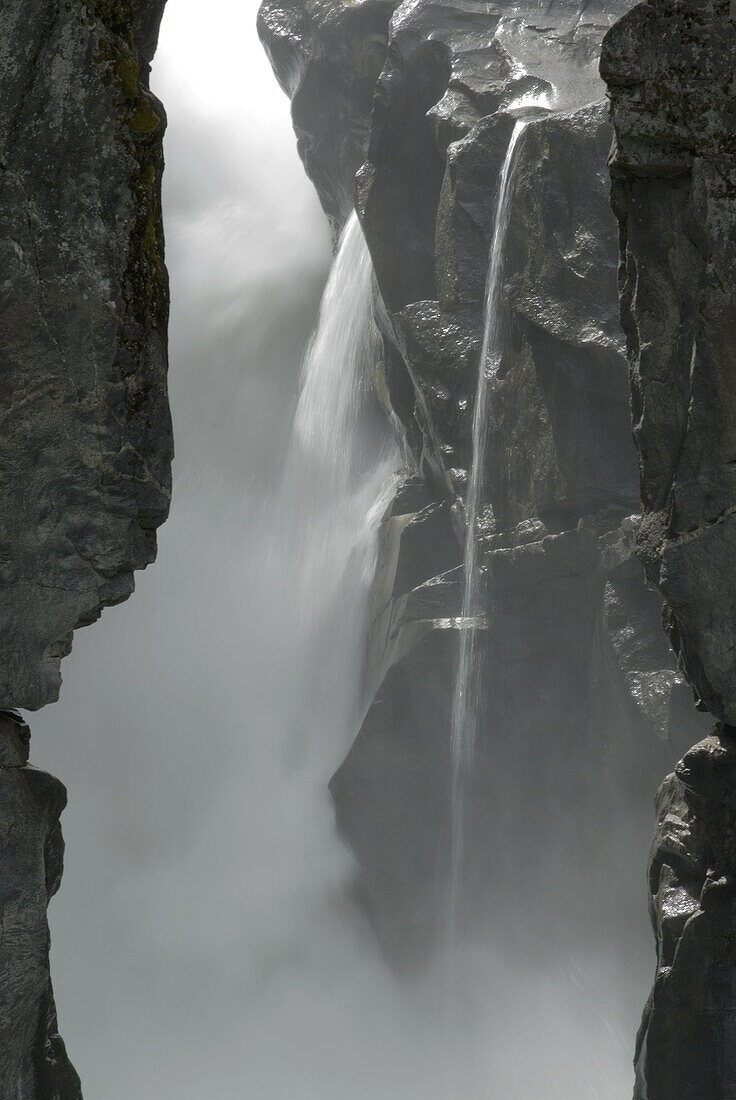 On the Duffy Lake road north of Whistler. Featuring dramatic waterfall on Green River. Nairn Falls Provincial park. British Columbia. Canada.