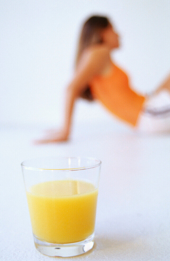 Woman and orange juice