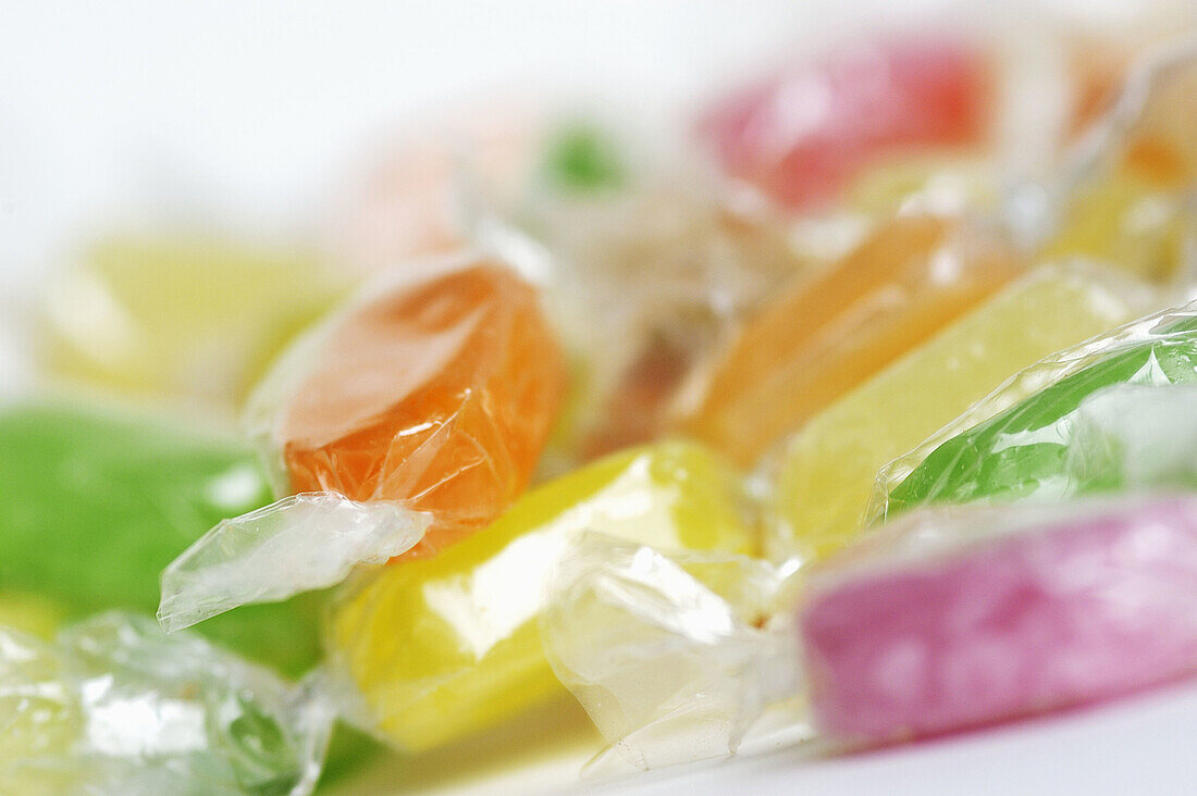  Candies, Candy, Childhood, Close up, Close-up, Closeup, Color, Colour, Concept, Concepts, Food, Horizontal, Indoor, Indoors, Infantile, Inside, Interior, Nourishment, Plastic, Selective focus, Still life, Sweet, Sweets, Wrapped, B19-317881, agefotostock 