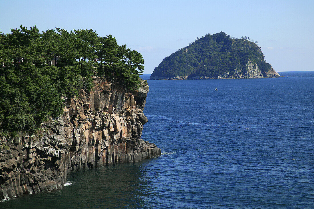 Rock Island of the the South Coast near Soegwipo Harbour. Jeju Island, Republic of Korea.