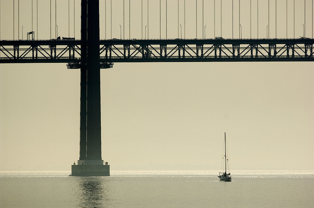  Architecture, Bridge, Bridges, Capital, Cities, City, Color, Colour, Communicate, Communication, Communications, Daytime, Engineering, Europe, Exterior, Fog, Horizontal, Lisboa, Lisbon, Mist, Outdoor, Outdoors, Outside, Portugal, River, Rivers, Sailboat,