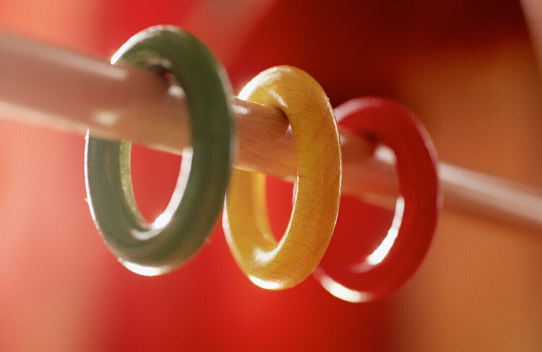  Childhood, Close up, Close-up, Closeup, Color, Colored, Colorful, Colors, Colour, Coloured, Colourful, Colours, Concept, Concepts, Detail, Details, Green, Horizontal, Indoor, Indoors, Infantile, Interior, Red, Rings, Stick, Sticks, Toy, Toys, Wood, Woode