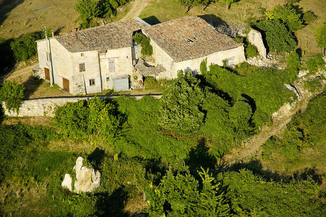 Aerial of an old Bastide villa near Moustiers-Sainte-Marie village. Alpes de Haute-Provence, Provence, France