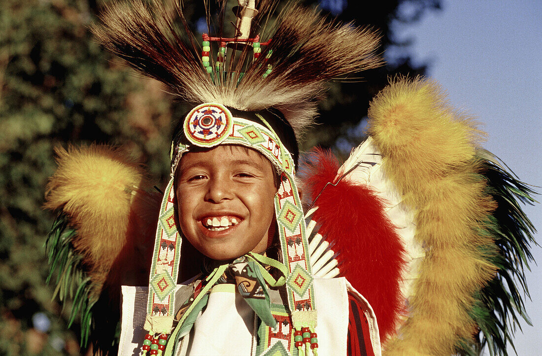 Young navajo dancer dressed in fancy attire for a pow wow. Navajo reservation. Chinle. Arizona. United states (USA)
