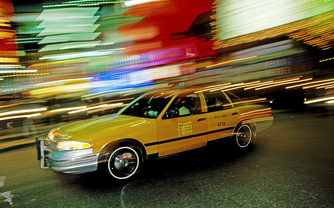 New York cab at night. USA.