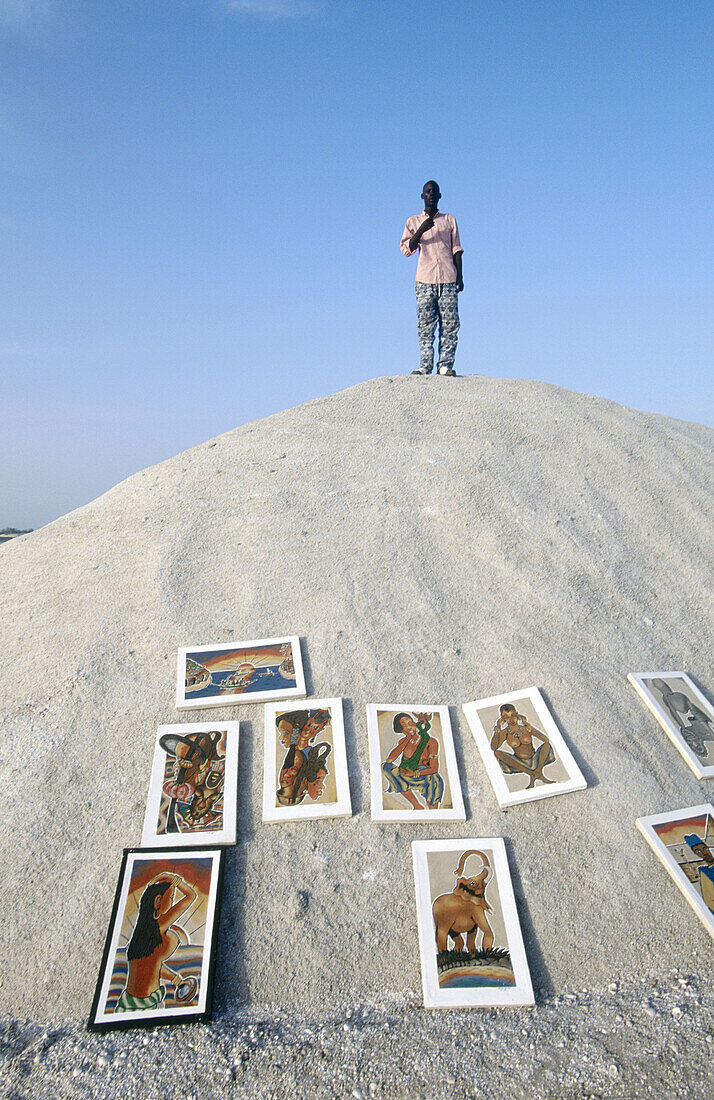 Artist exhibition on heaps of dried salt. Redba salted lake (also called Lac Rose). Cap-Vert. Senegal.