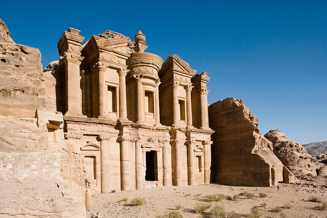 The Deir, also called Monastery, has been carved in the rock on top of mountain at II th century BC by the Nabatean people. This temple was a place of worship and later on used as a primitive church. Archeological site of Petra. Jordan.