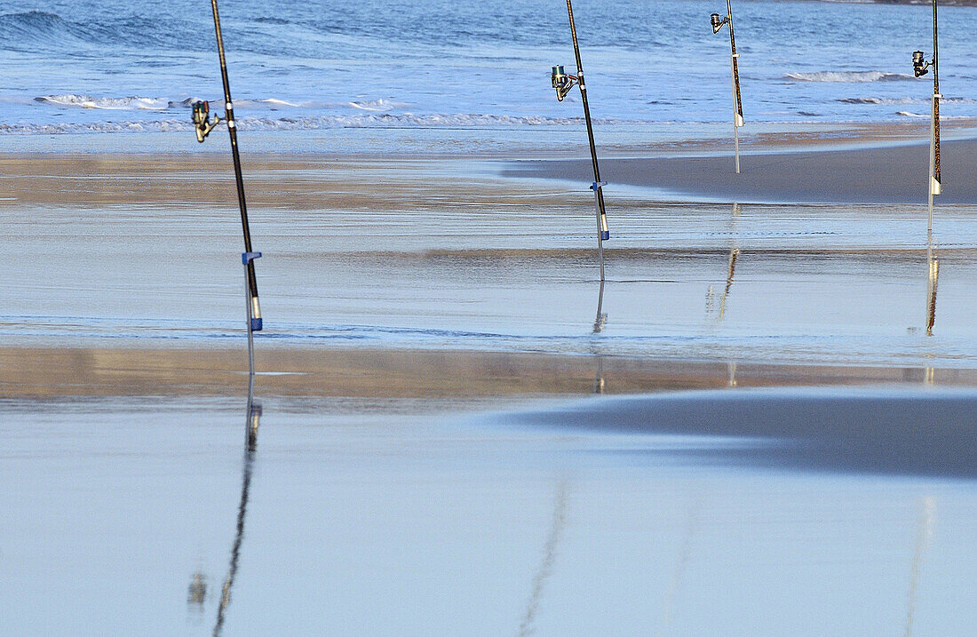 Sport fishing at beach. Hendaye, Aquitaine. France