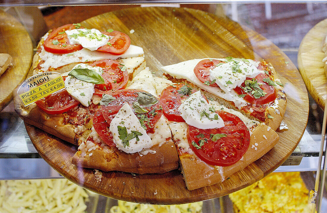 Italian typical fast food: pizza. Florence. Tuscany, Italy