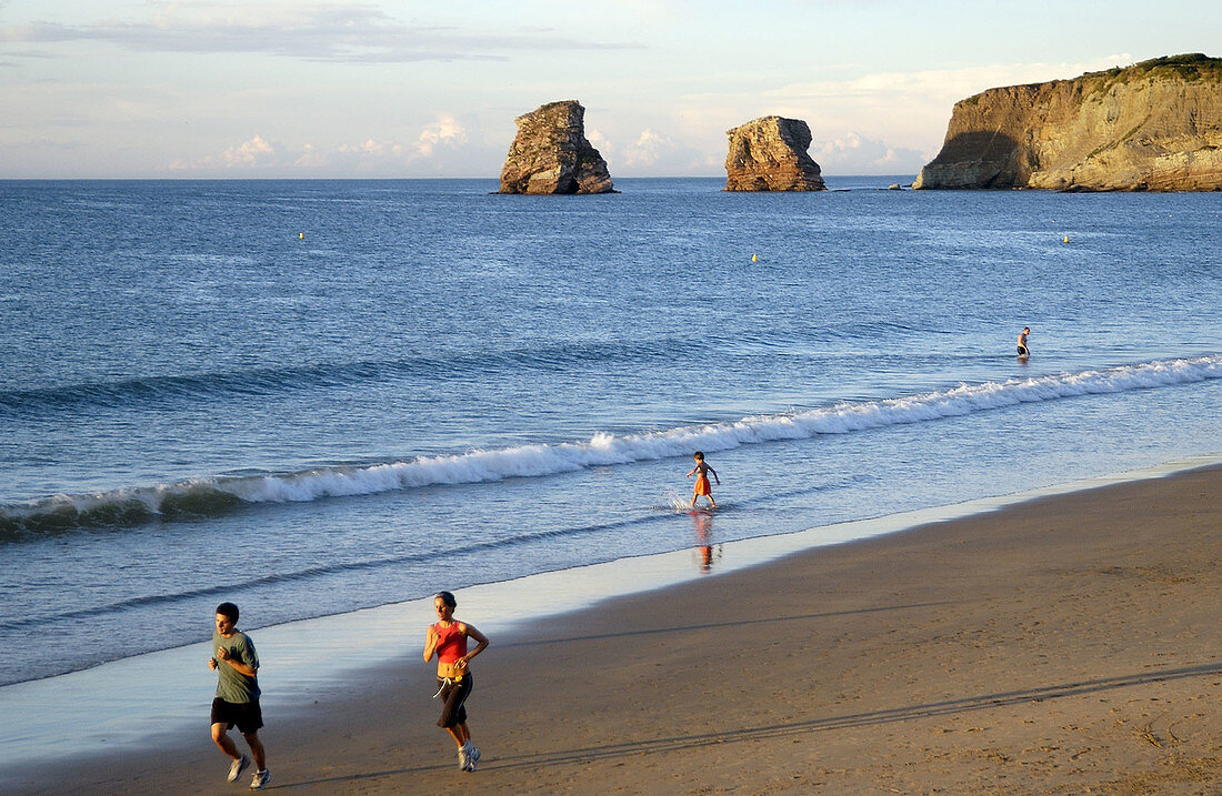 Beach. Twin rocks to the rear. Hendaye. Aquitaine. France.