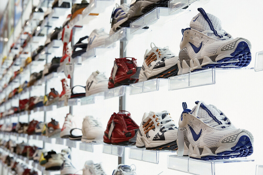 Sports shoes in shoe shop, shopping mall