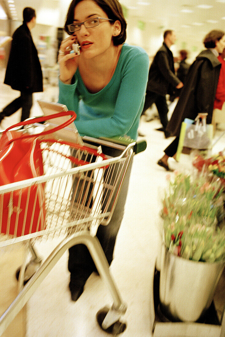 Woman with a shopping cart