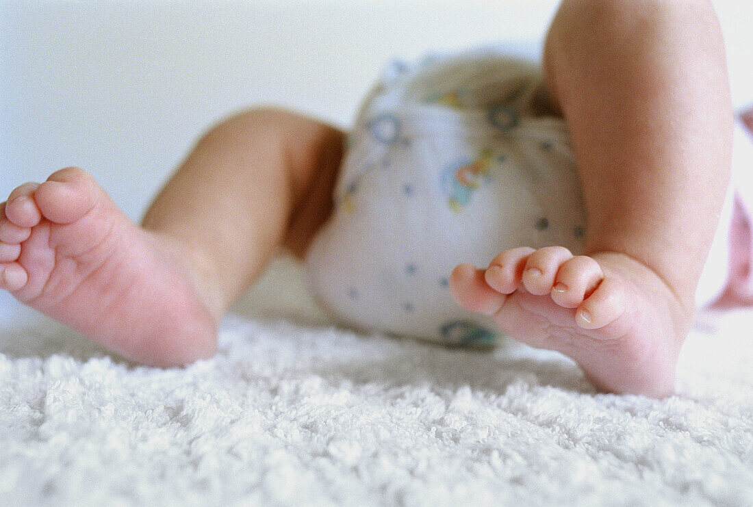  0 to 6 months, 0-6 months, 1 to 6 months, 1-6 months, Babies, Baby, Child, Children, Close up, Close-up, Closeup, Color, Colour, Contemporary, Delicate, Detail, Details, Diaper, Diapers, Feet, Foot, Fragile, Fragility, Horizontal, Human, Indoor, Indoors,