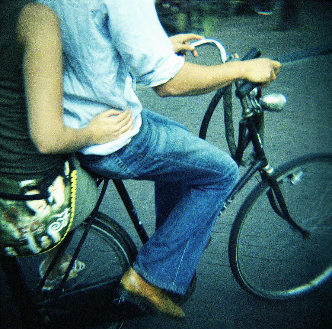  Adult, Adults, Anonymous, Bicycle, Bicycles, Bike, Bikes, Biking, Blue jean, Blue jeans, Boy, Boys, Cities, City, Color, Colour, Companion, Companions, Contemporary, Couple, Couples, Cycle, Cycles, Daytime, Denim, Exterior, Female, Friend, Friends, Frien