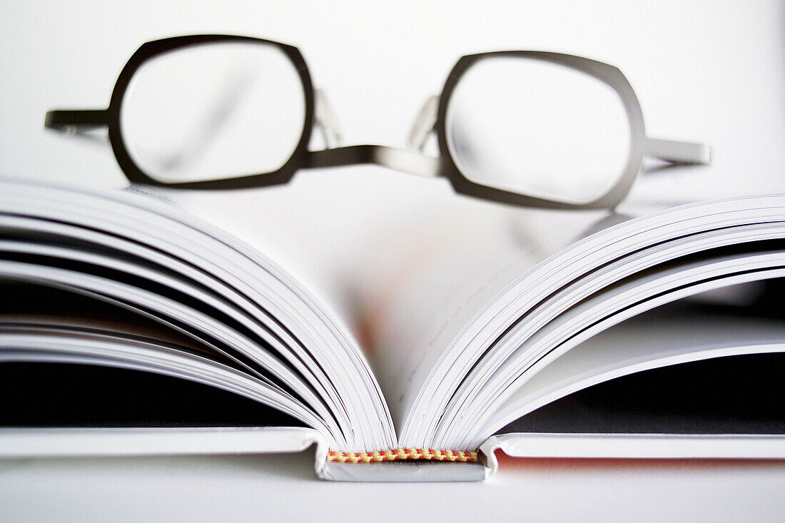  Accessories, Accessory, Book, Books, Color, Colour, Concept, Concepts, Entertainment, Eyeglasses, Glasses, Indoor, Indoors, Inside, Interior, Leisure, Object, Objects, Open, Optics, Page, Pages, Prescription glasses, Reading, Reading matter, Reading matt