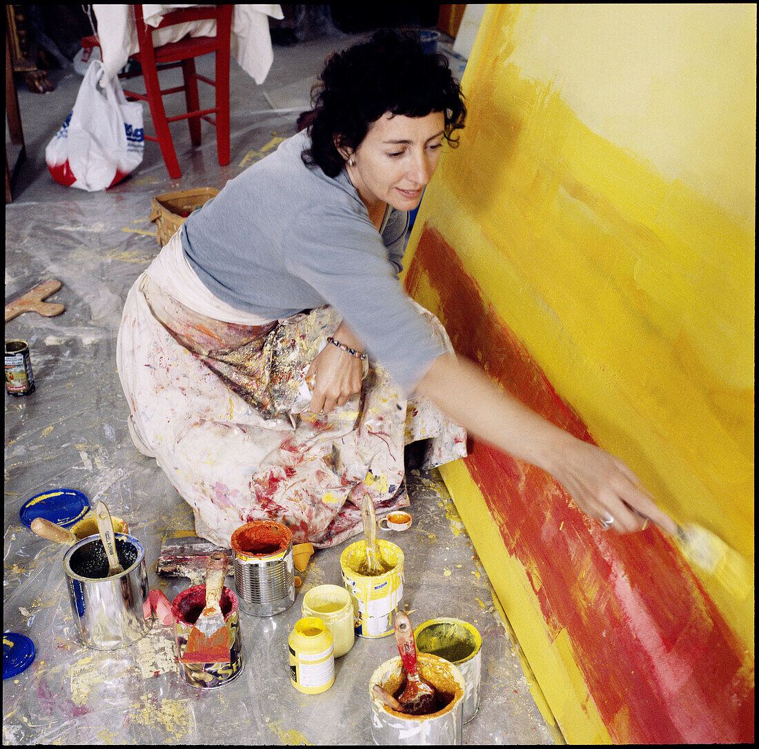 Painter in her workshop.