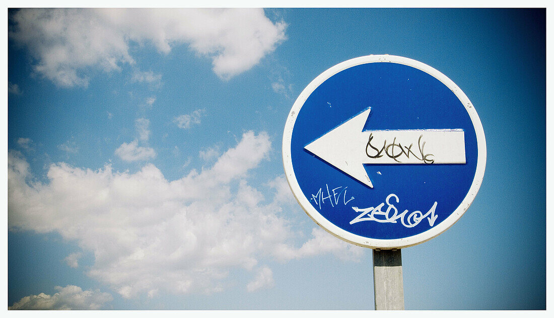  Arrow, Arrows, Bearing, Blue, Close up, Close-up, Closeup, Cloud, Clouds, Color, Colour, Concept, Concepts, Daytime, Direction, Exterior, Obligation, Obligations, One way, Orientation, Outdoor, Outdoors, Outside, Road sign, Road Signs, Skies, Sky, Symbol