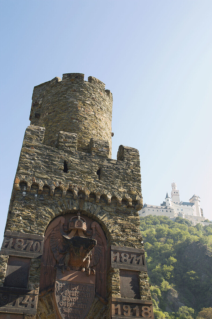 Medieval Gate with Marksburg Castle towering overhead-15th century and considered the best preserved Rhine castle. Braubach, Rhine River, Western Germany