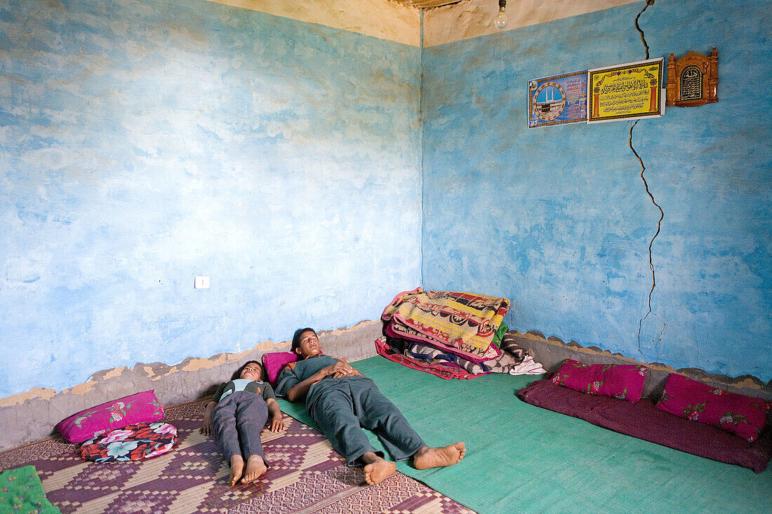 Private adobe house painted in pale blue. Oasis of Bahariya. Egypt