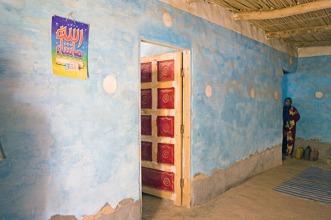 Private adobe house painted in pale blue. Oasis of Bahariya. Egypt