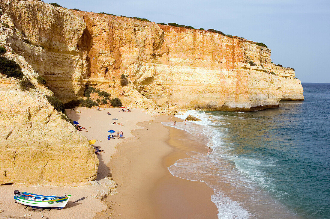 Small beach and fishermen harbour on the coast near Albufeira. Algarve. Portugal