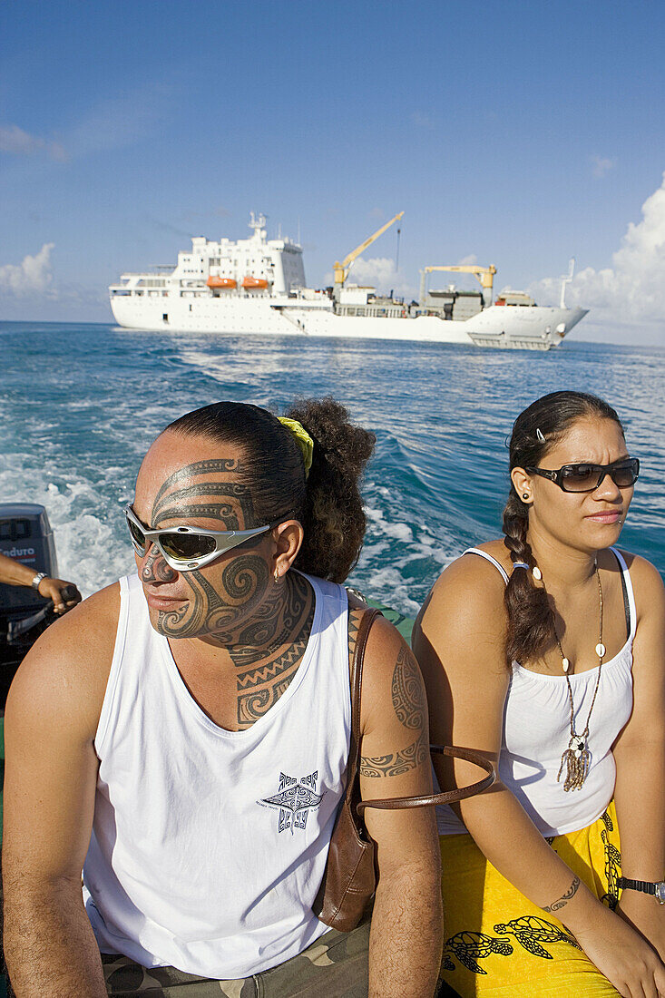 The passengers. Cruise on Aranui III, cargo and passenger vessel, delivering goods to Marquesas and Tuamotus islands from Tahiti and picking coprah, fruits and fishes on her way back. Marquesas archipelago. French Polynesia
