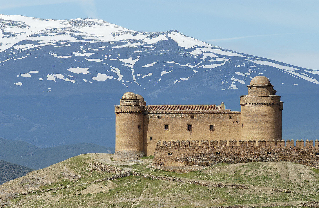 Lacalahorra Castle and Sierra Nevada mountains. Granada province. Spain