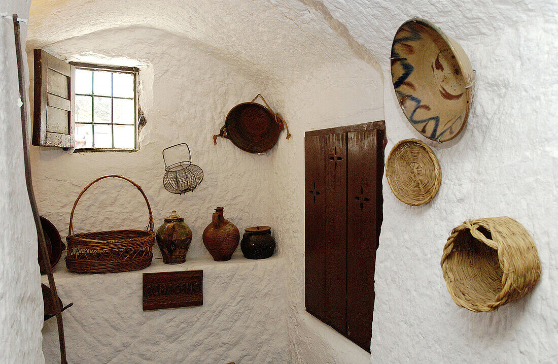 Home interior at Santiago troglodyte quarter. Guadix. Granada province. Spain