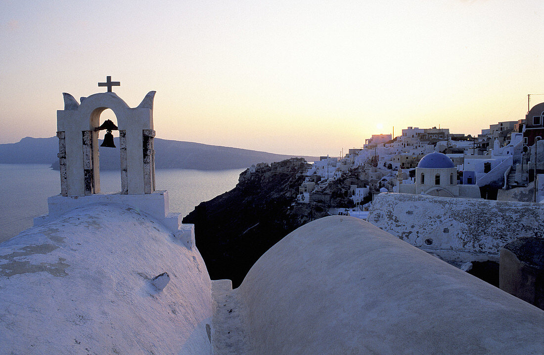 White washed Church belfry. Ia village. Santorini (Cyclades). Greece