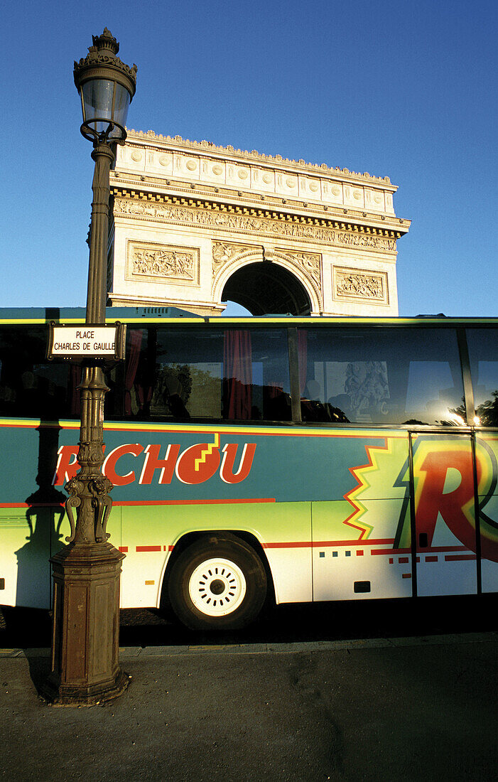Arc de Triomphe and tourist bus. Paris. France