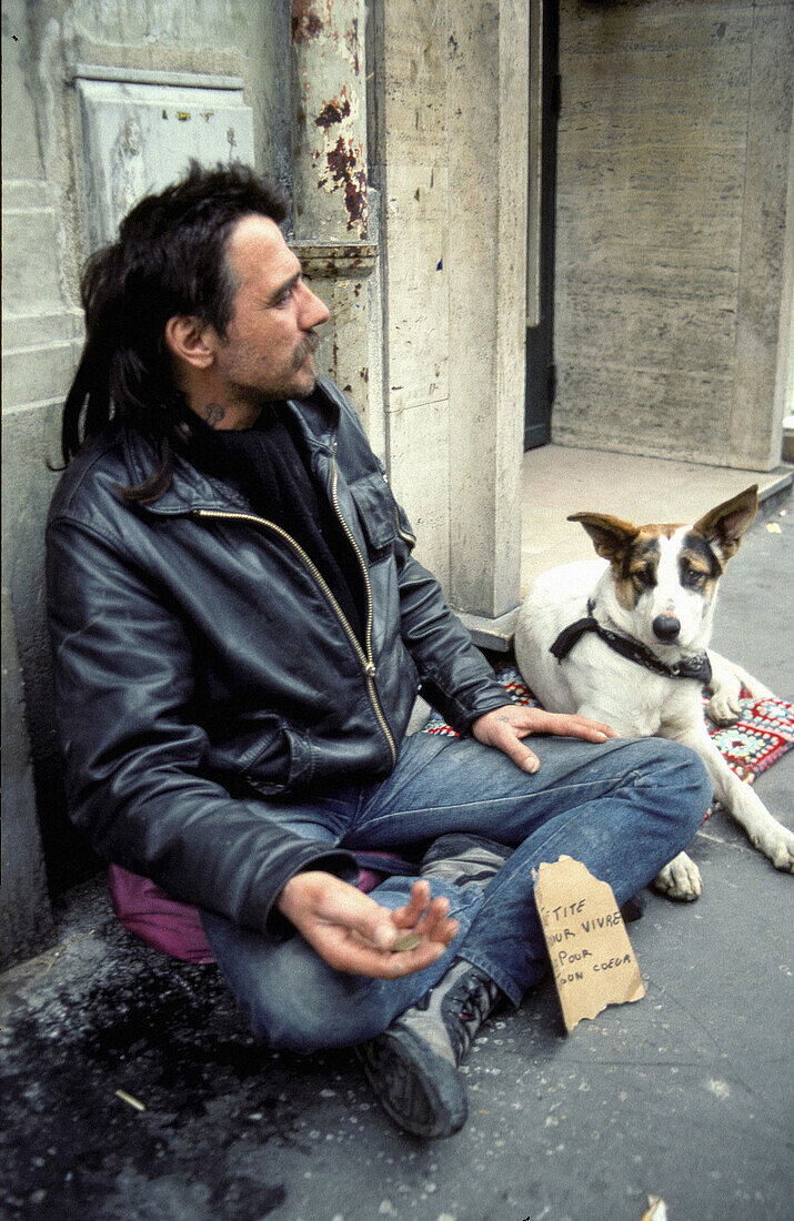 Homeless begging (shot 1976). Paris. France