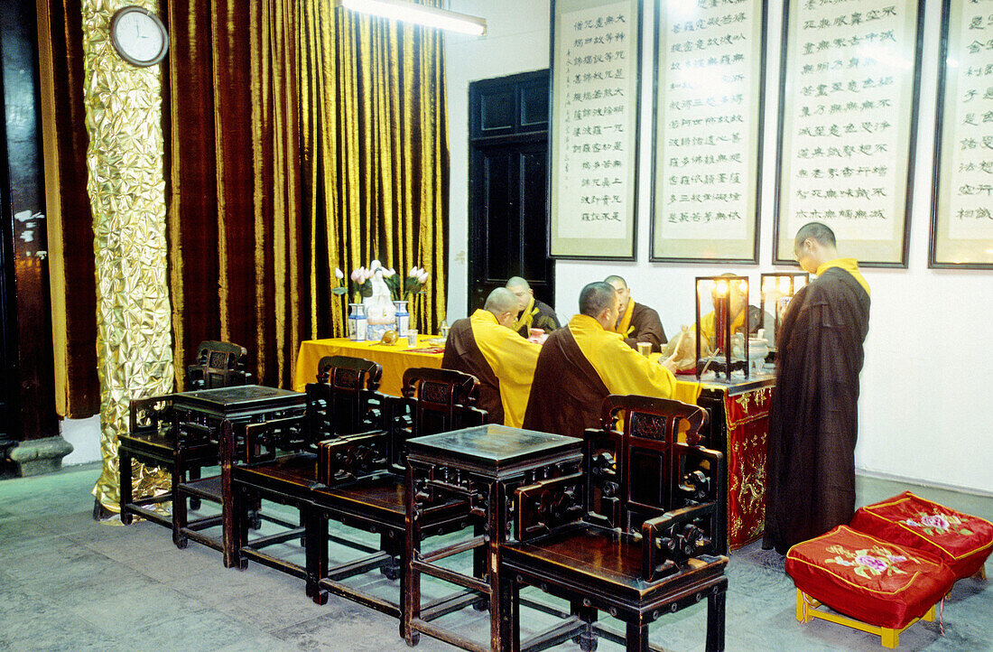 Intimate ceremony for grandfather s death first anniversary at the Jade Buddha temple. Shanghai. China