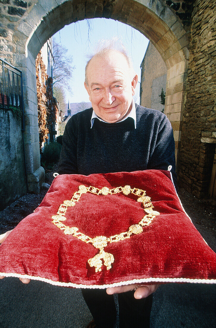 Owner showing his Golden Fleece necklace. Burgundy, France