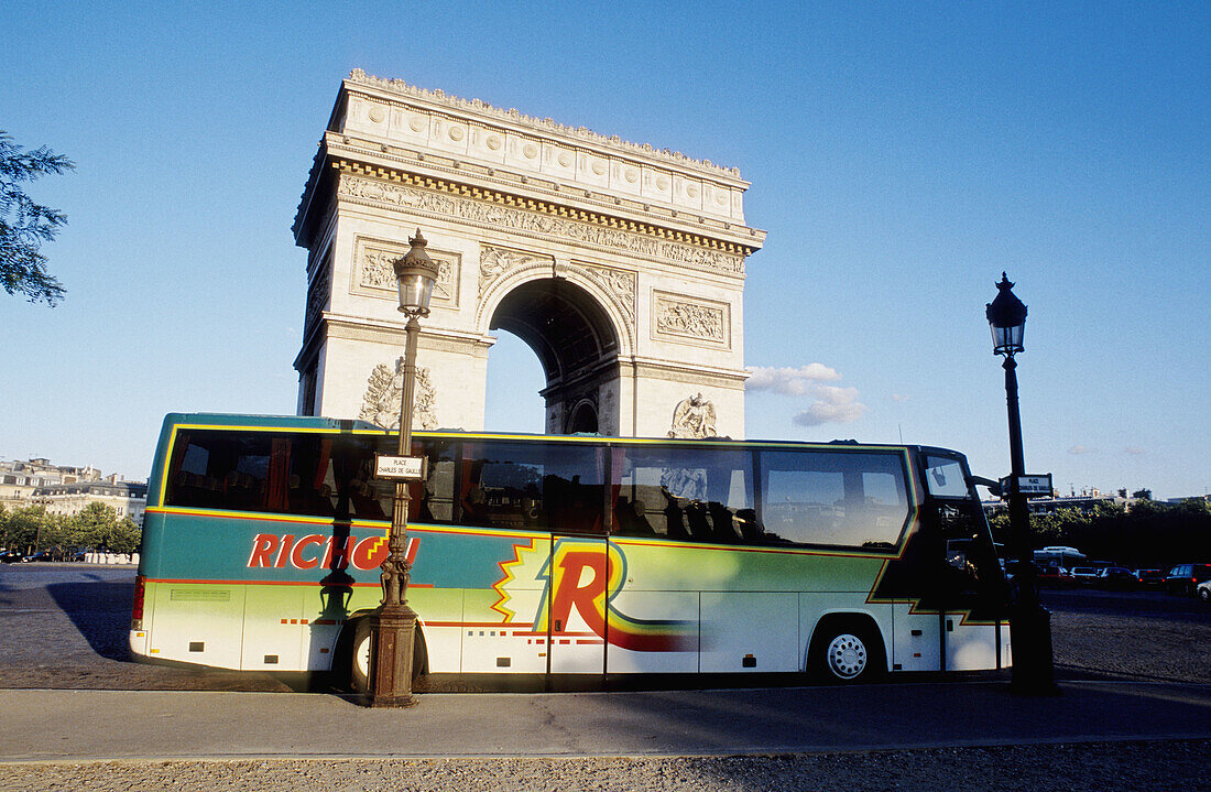 Arc de Triomphe and tourist bus. Paris. France
