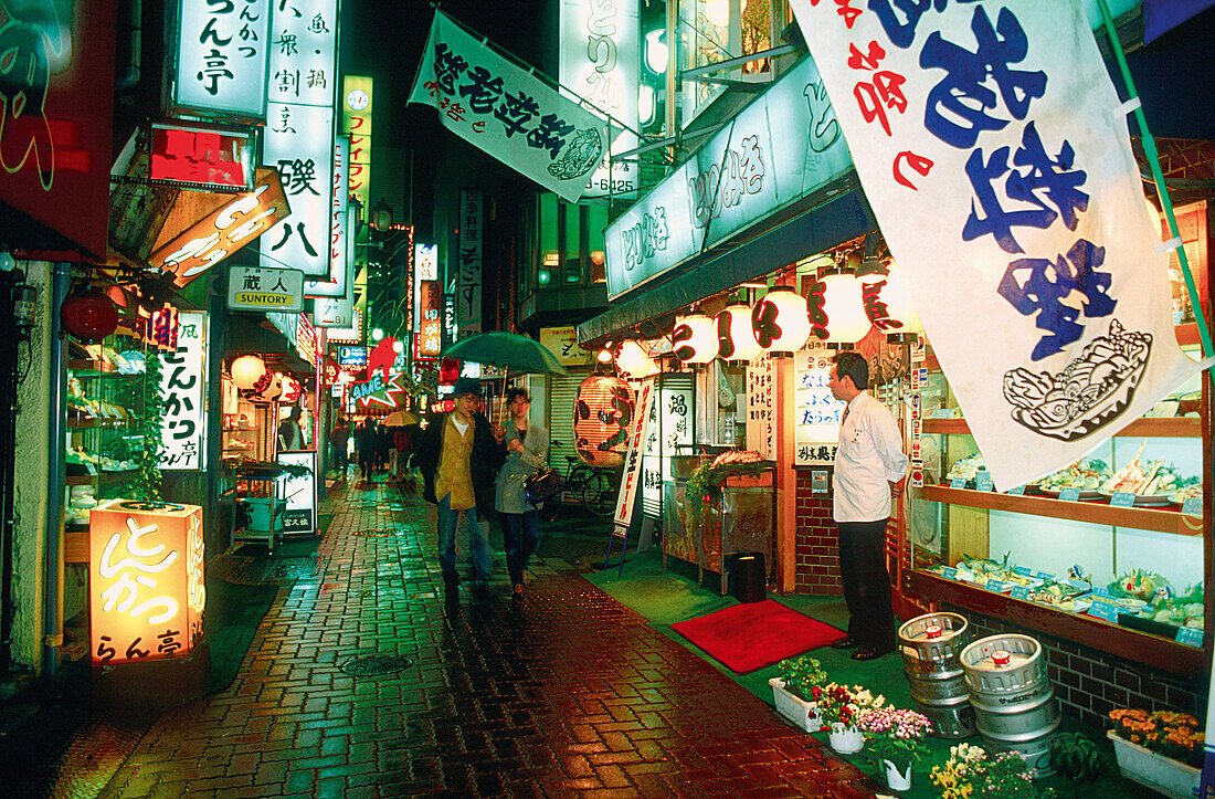 Street scene at night, Ginza. Tokyo, Japan