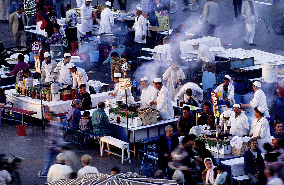 Dining in Jemaa El-Fna square, the liveliest place night and day in Marrakech. Morocco