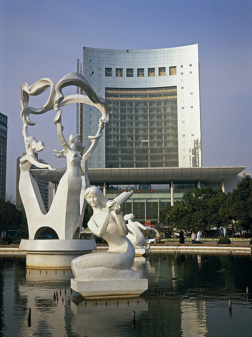 People Square: City Hall and basin with sculptures at fore. Hangzhou. Zhejiang province, China