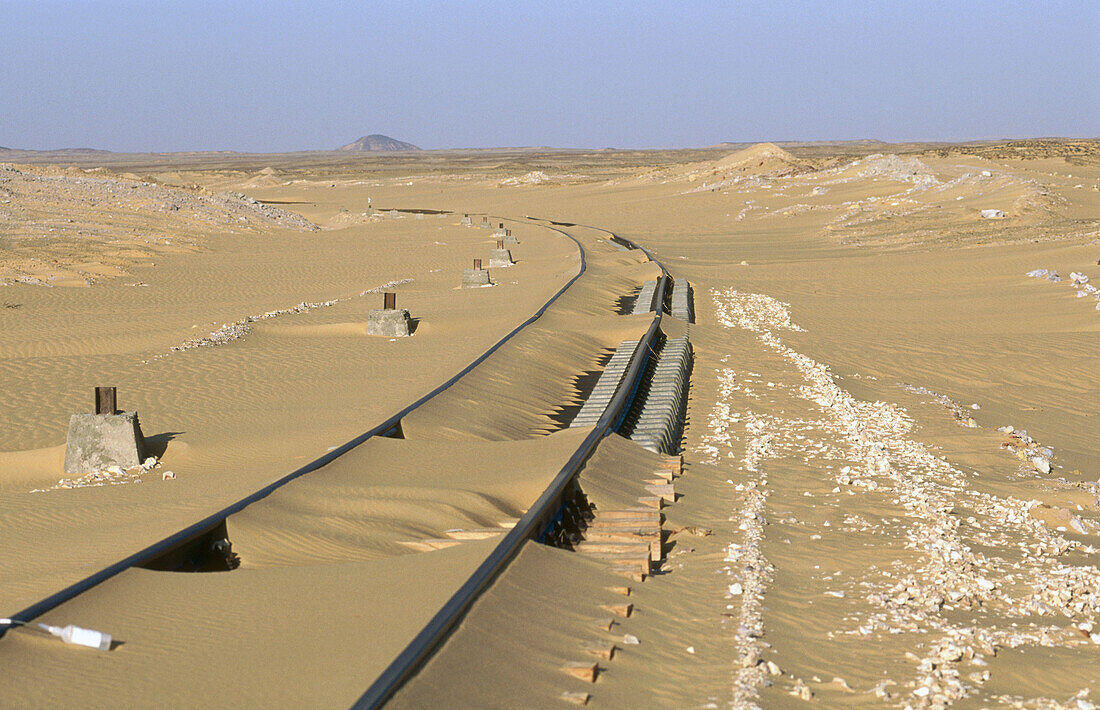 Railroad in the desert near Dahkla oasis. Lybian desert, Egypt